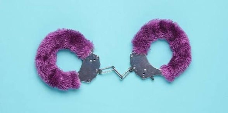 Plush purple handcuffs