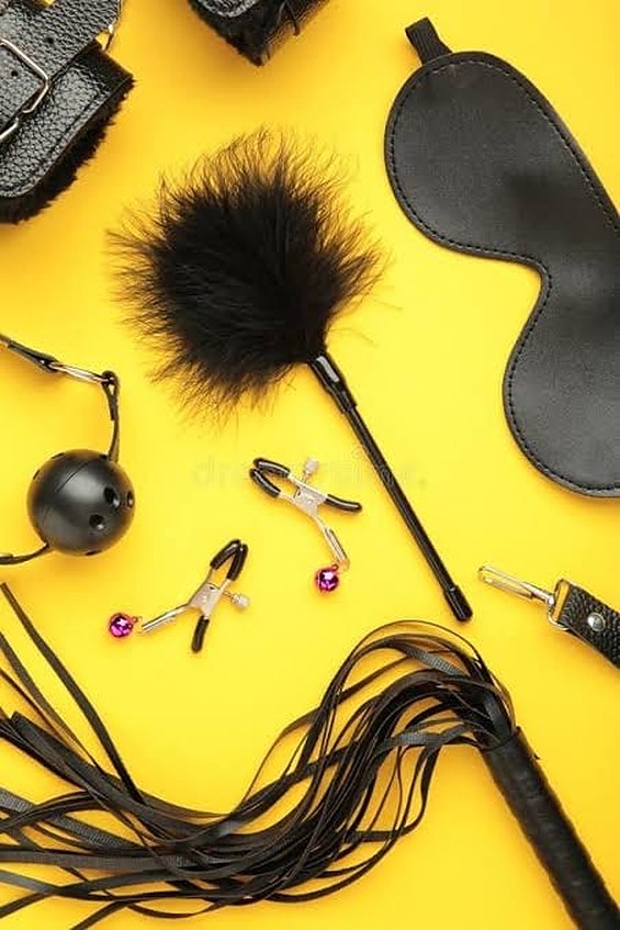 Feather tickler, blindfold, flogger and clamps